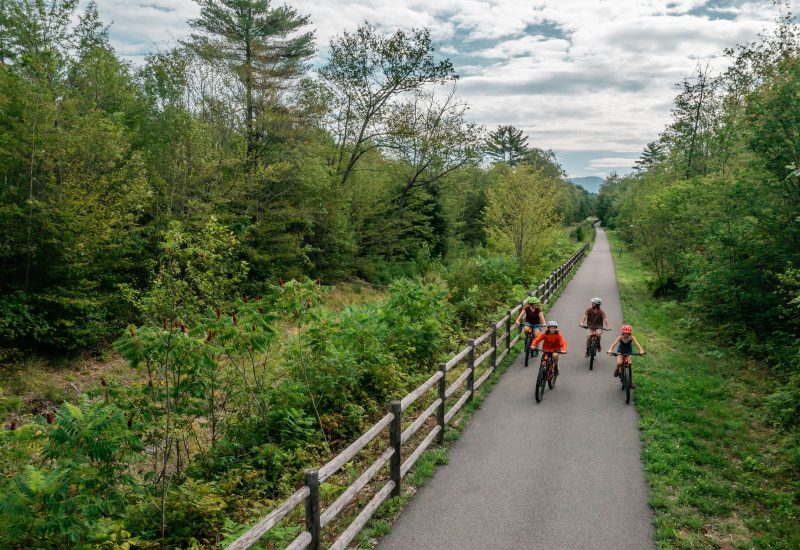 Aerial shot of family riding rec path