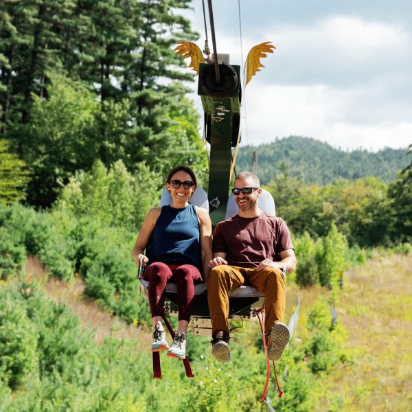 Couple riding Flying Eagle